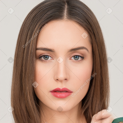 Neutral white young-adult female with long  brown hair and brown eyes