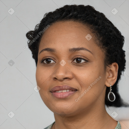 Joyful latino young-adult female with short  black hair and brown eyes