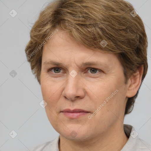 Joyful white adult female with short  brown hair and brown eyes