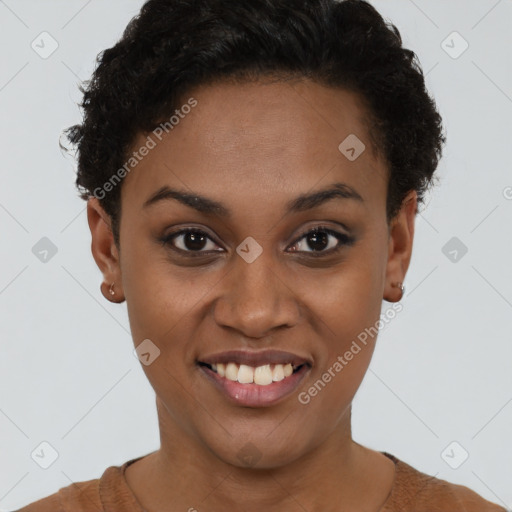 Joyful black young-adult female with short  brown hair and brown eyes