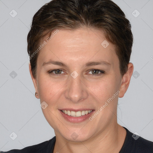 Joyful white young-adult female with short  brown hair and grey eyes