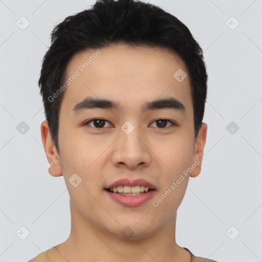 Joyful asian young-adult male with short  black hair and brown eyes