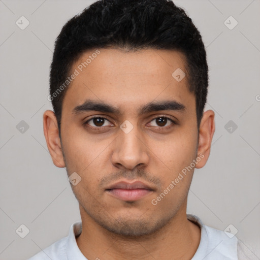 Neutral latino young-adult male with short  black hair and brown eyes