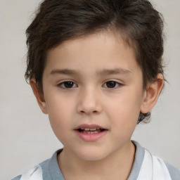 Joyful white child male with short  brown hair and brown eyes