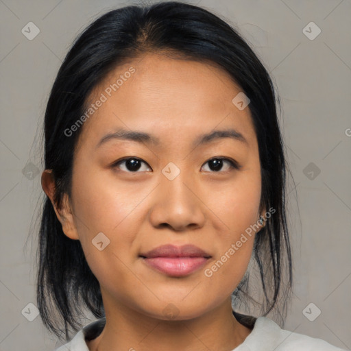 Joyful asian young-adult female with medium  black hair and brown eyes