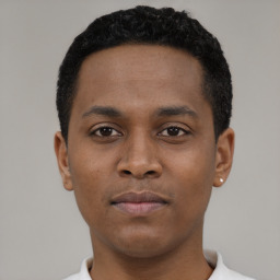 Neutral black young-adult male with short  black hair and brown eyes