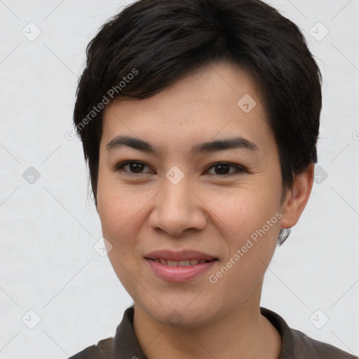 Joyful asian young-adult female with short  brown hair and brown eyes