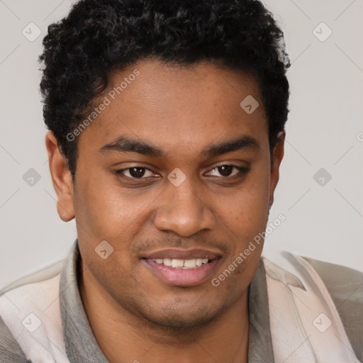 Joyful black young-adult male with short  brown hair and brown eyes