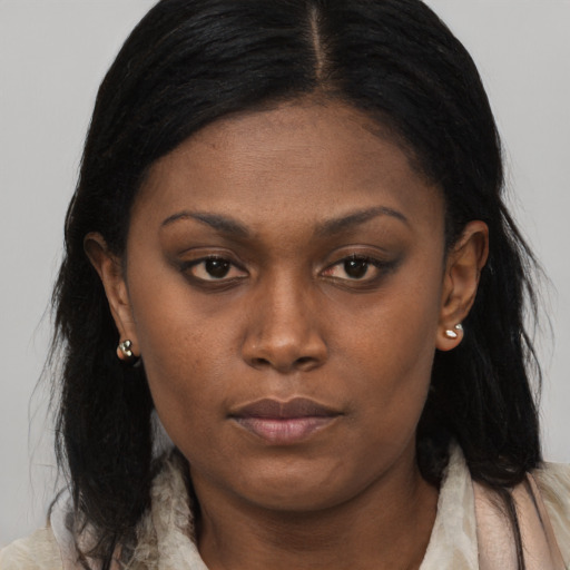 Neutral black young-adult female with long  black hair and brown eyes