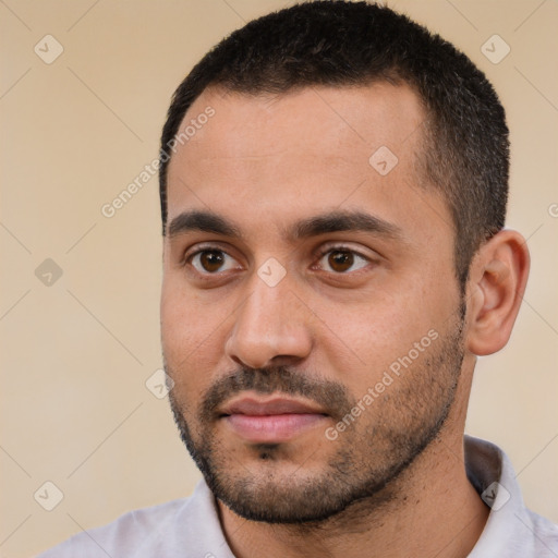 Neutral white young-adult male with short  black hair and brown eyes