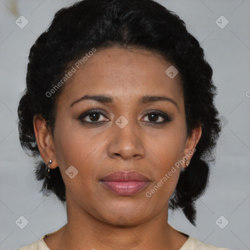 Joyful black young-adult female with medium  brown hair and brown eyes