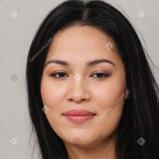 Joyful asian young-adult female with long  brown hair and brown eyes