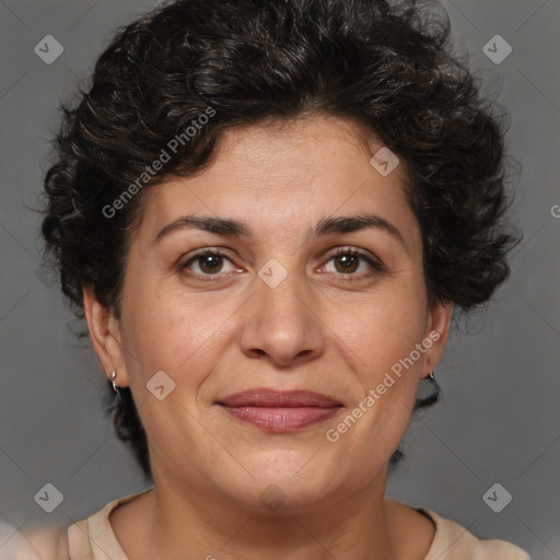 Joyful white adult female with short  brown hair and brown eyes