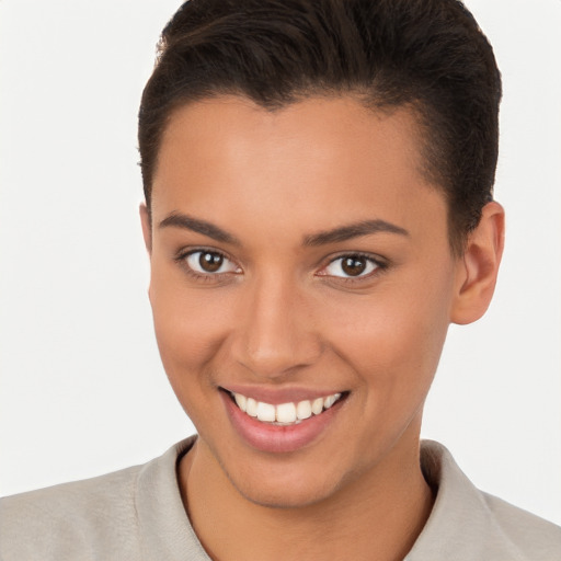 Joyful white young-adult female with short  brown hair and brown eyes