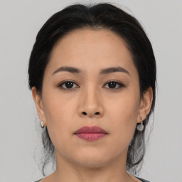 Neutral asian young-adult female with medium  black hair and brown eyes