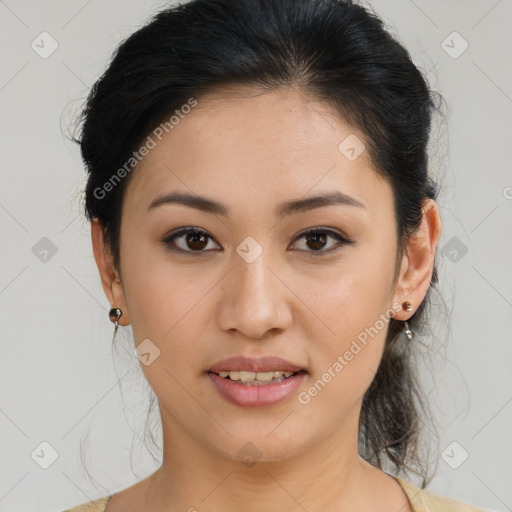 Joyful latino young-adult female with medium  brown hair and brown eyes