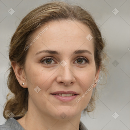 Joyful white adult female with medium  brown hair and grey eyes