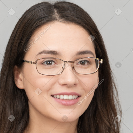 Joyful white young-adult female with long  brown hair and grey eyes