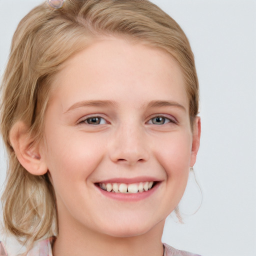 Joyful white child female with long  brown hair and blue eyes