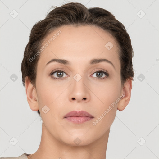 Neutral white young-adult female with short  brown hair and brown eyes