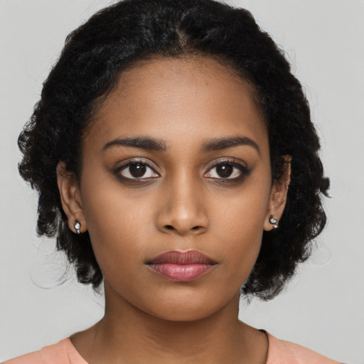 Neutral black young-adult female with long  black hair and brown eyes
