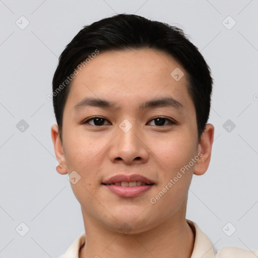 Joyful asian young-adult male with short  brown hair and brown eyes