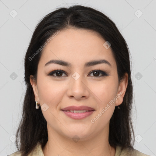 Joyful latino young-adult female with long  brown hair and brown eyes