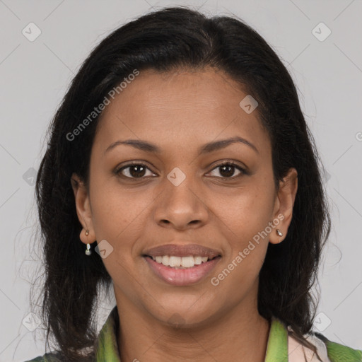 Joyful black young-adult female with medium  brown hair and brown eyes