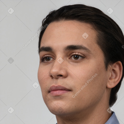 Neutral white young-adult male with short  black hair and brown eyes