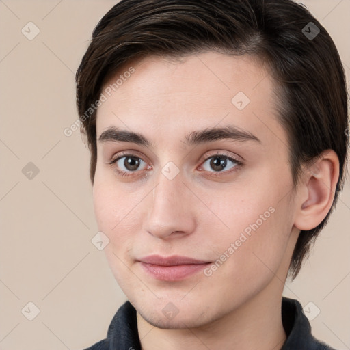 Joyful white young-adult male with medium  brown hair and brown eyes