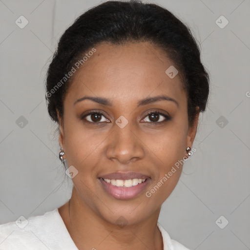 Joyful black young-adult female with short  brown hair and brown eyes