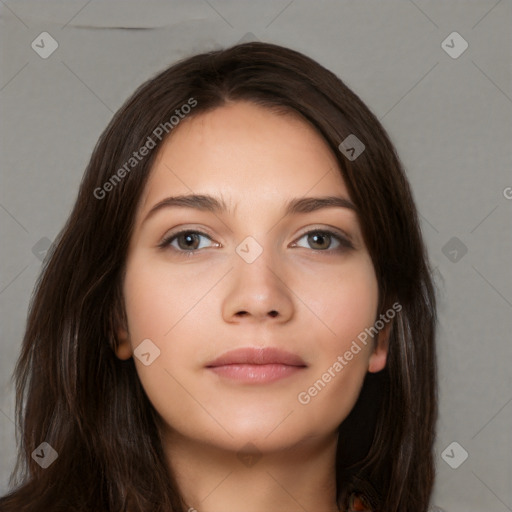 Neutral white young-adult female with long  brown hair and brown eyes