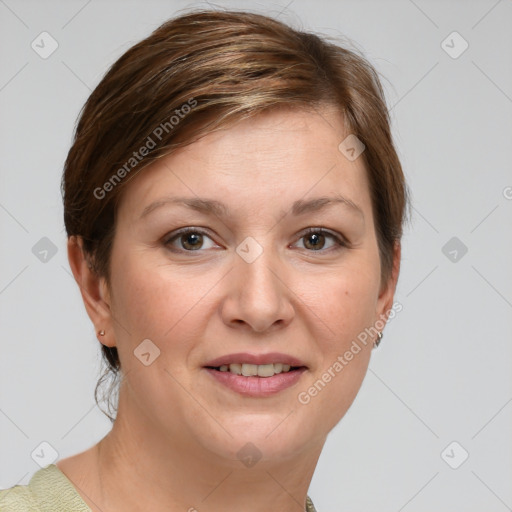 Joyful white young-adult female with short  brown hair and grey eyes