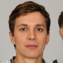 Neutral white adult male with short  brown hair and brown eyes