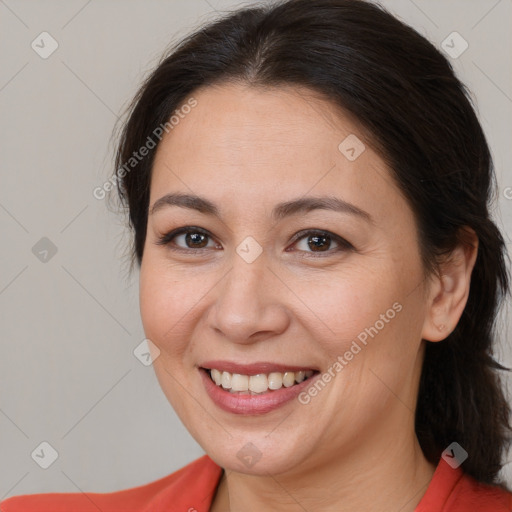 Joyful white young-adult female with medium  brown hair and brown eyes