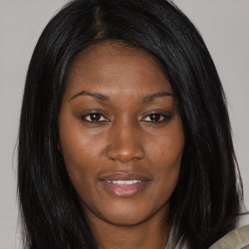 Joyful asian young-adult female with long  black hair and brown eyes