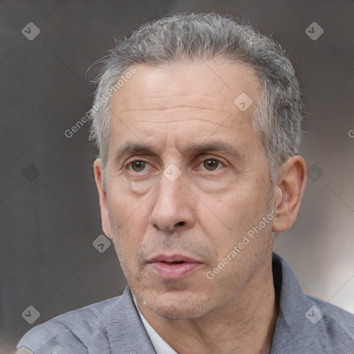 Neutral white middle-aged male with short  gray hair and brown eyes