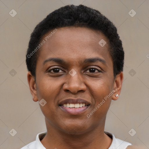 Joyful black young-adult female with short  black hair and brown eyes