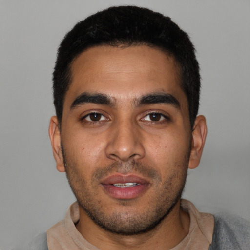 Neutral latino young-adult male with short  black hair and brown eyes