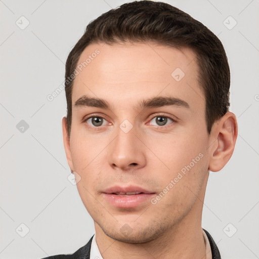 Neutral white young-adult male with short  brown hair and brown eyes