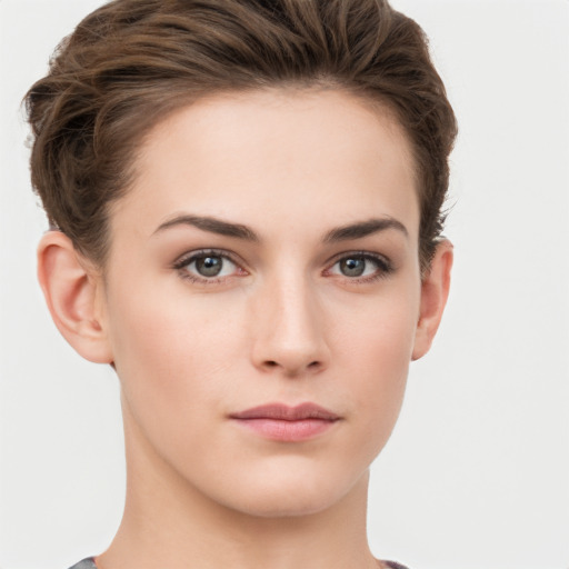 Neutral white young-adult female with short  brown hair and brown eyes