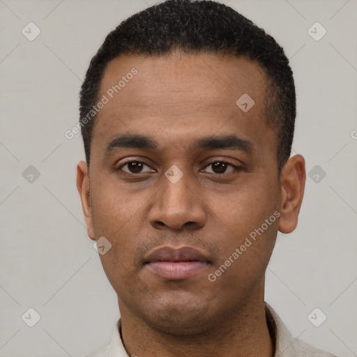 Neutral latino young-adult male with short  black hair and brown eyes