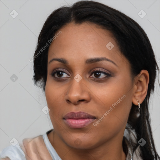 Joyful latino young-adult female with medium  black hair and brown eyes