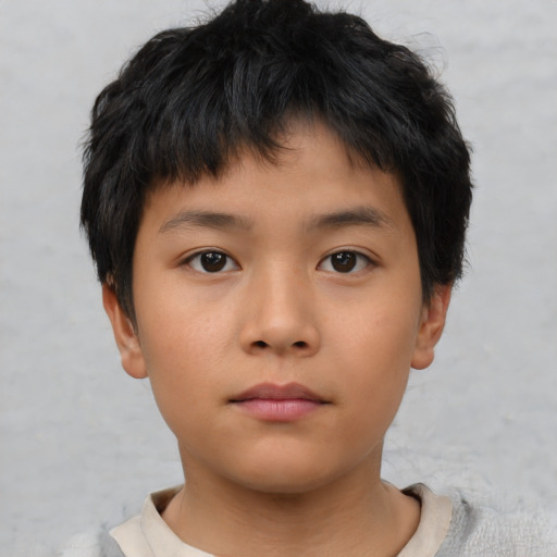 Neutral asian child male with short  brown hair and brown eyes