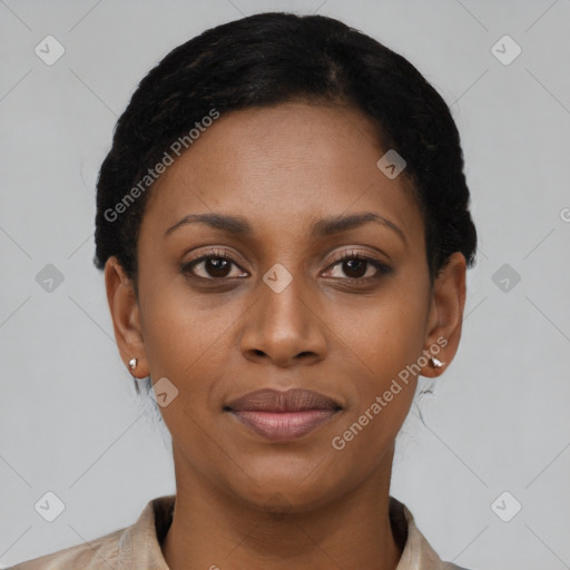 Joyful black young-adult female with short  brown hair and brown eyes