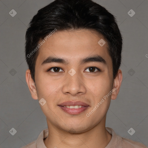 Joyful asian young-adult male with short  brown hair and brown eyes