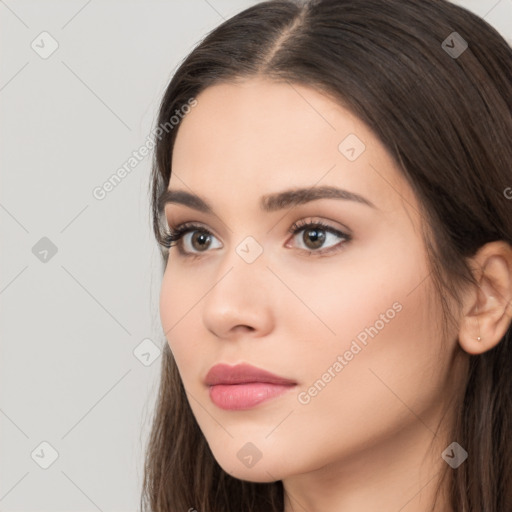 Neutral white young-adult female with long  brown hair and brown eyes