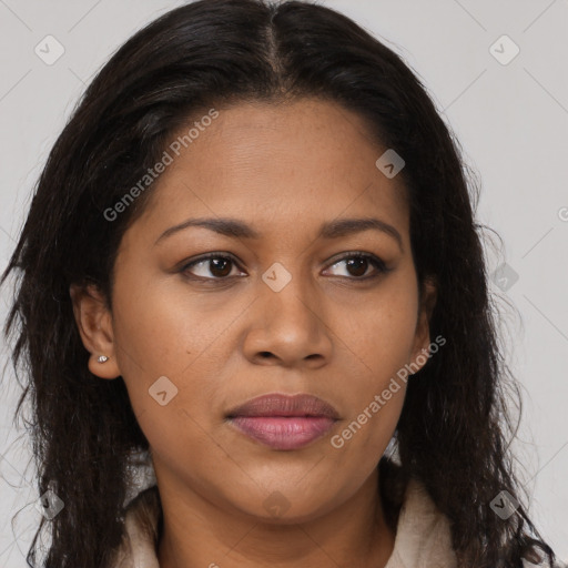 Joyful black young-adult female with long  brown hair and brown eyes