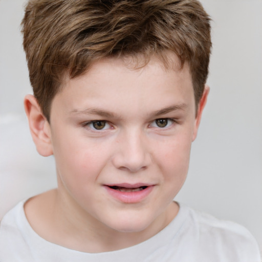 Joyful white child male with short  brown hair and grey eyes