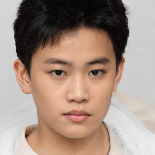 Neutral asian child male with short  brown hair and brown eyes